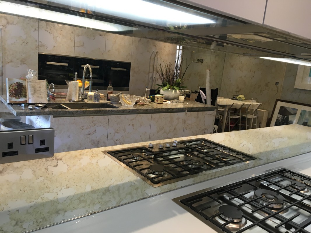 Mirror glass splashback in Hayes luxury kitchen