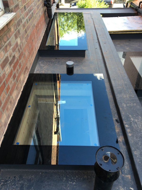 Multiple flat roof skylights on extension in Hayes